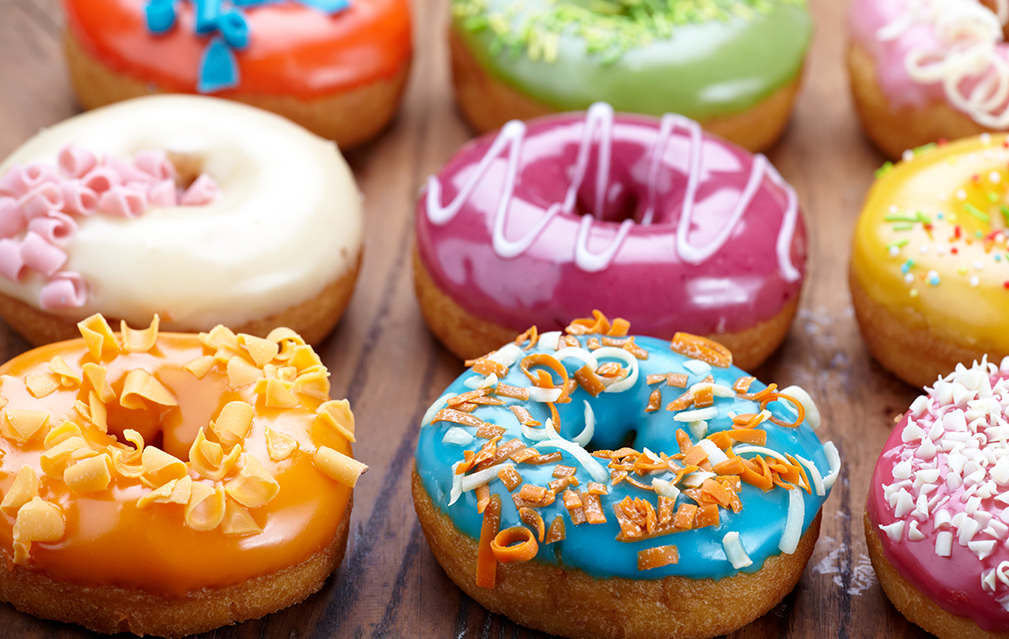 FoodRGB Natural food color application photography for confectionery frosting in yellow, orange, purple, and blue