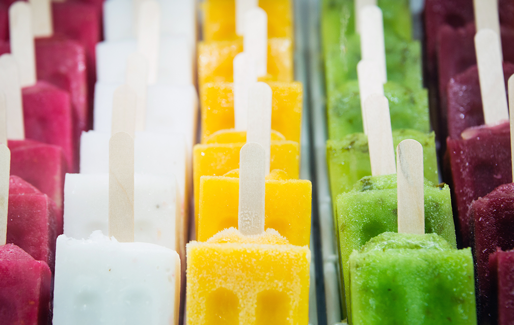 FoodRGB Natural food color application photography for confectionery ice pops green, yellow, and orange